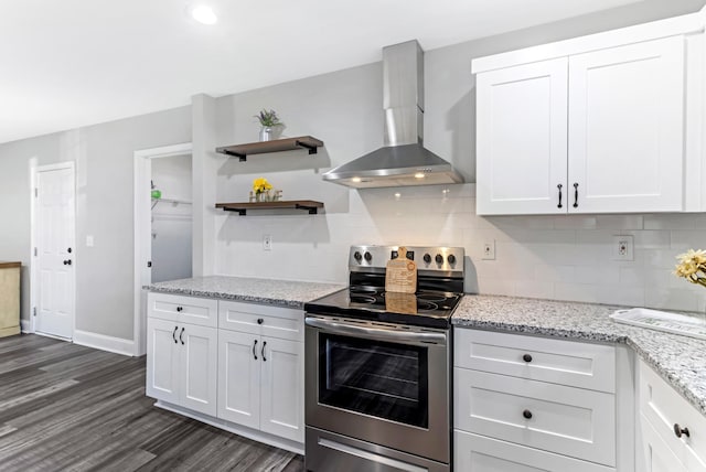 340 W Peachtree, Woodruff, SC 29388 - kitchen with tasteful backsplash, white cabinets, stainless steel electric range oven, and wall chimney exhaust hood