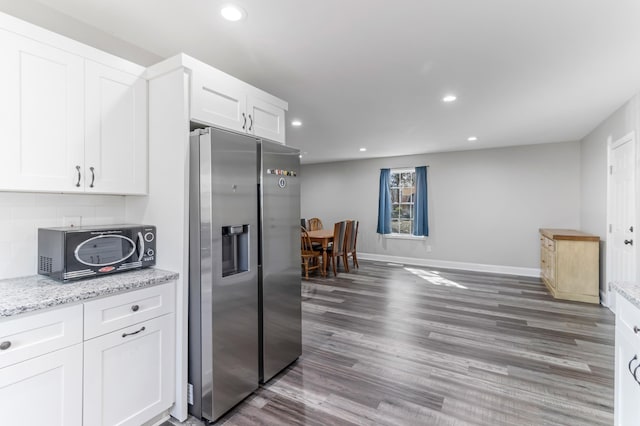 340 W Peachtree, Woodruff, SC 29388 - kitchen with recessed lighting, white cabinetry, stainless steel fridge with ice dispenser, and wood finished floors