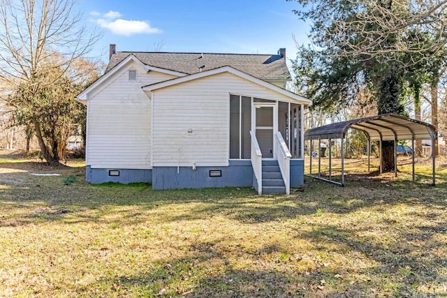340 W Peachtree, Woodruff, SC 29388 - view of home's exterior with a sunroom, a yard, crawl space, a carport, and a chimney