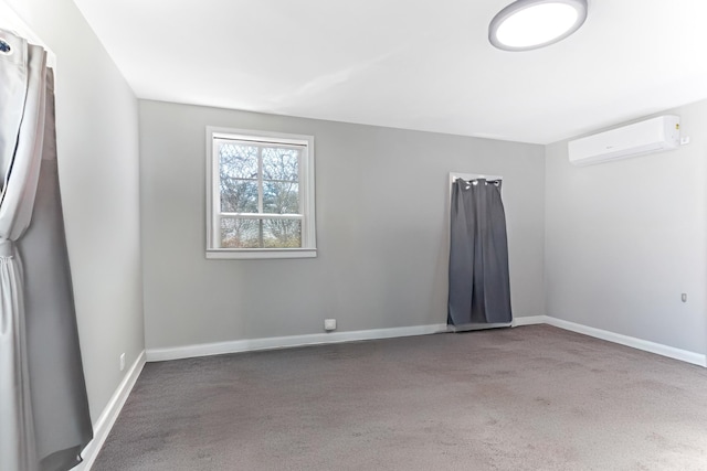 340 W Peachtree, Woodruff, SC 29388 - unfurnished room with carpet floors, a wall mounted air conditioner, and baseboards