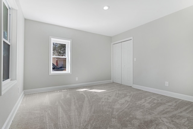 340 W Peachtree, Woodruff, SC 29388 - unfurnished bedroom featuring carpet floors, baseboards, a closet, and recessed lighting