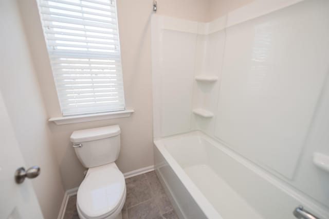 full bath featuring toilet, baseboards, and tile patterned floors