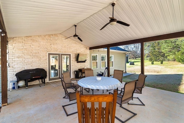 view of patio / terrace with ceiling fan, french doors, outdoor dining area, and area for grilling