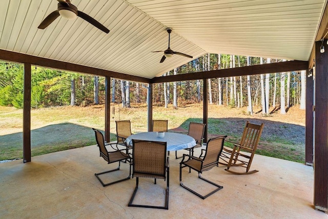 view of patio / terrace with outdoor dining space and a ceiling fan