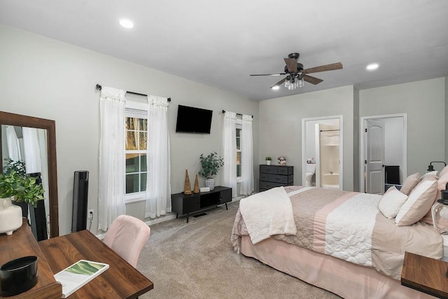 carpeted bedroom featuring ensuite bathroom, a ceiling fan, and recessed lighting