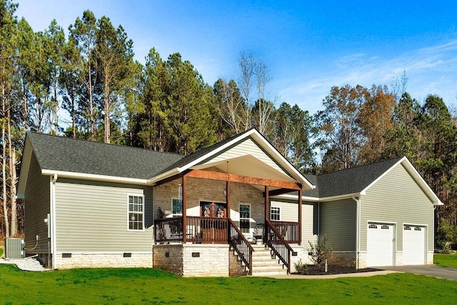 view of front of house featuring a porch, central AC unit, an attached garage, crawl space, and a front lawn