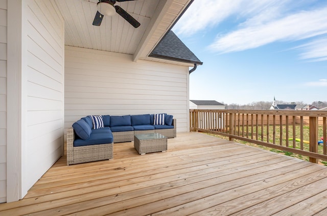 wooden deck featuring ceiling fan and an outdoor hangout area