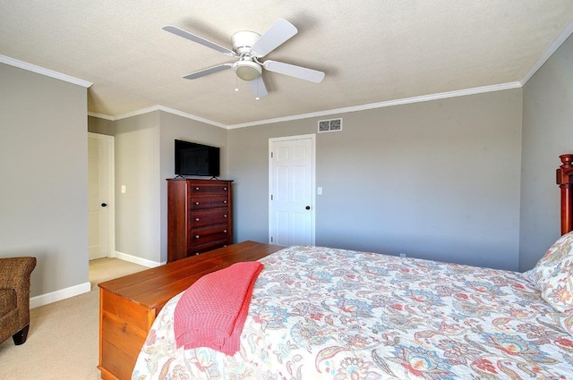 carpeted bedroom with visible vents, a textured ceiling, and ornamental molding