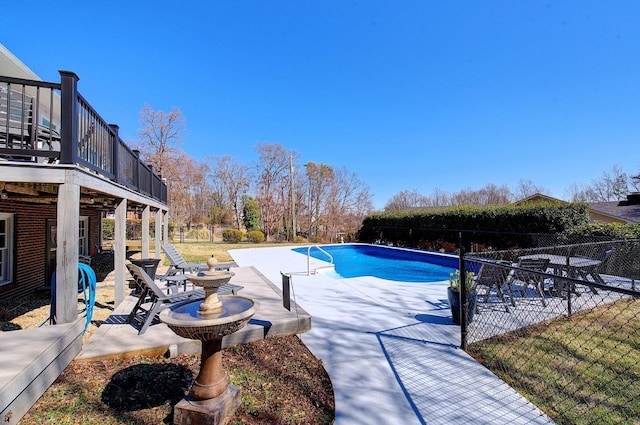 view of pool with a fenced in pool, a patio, and fence