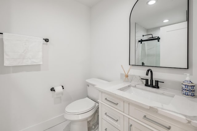 full bath featuring recessed lighting, a shower stall, toilet, and vanity