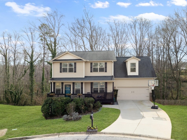 view of front of home featuring a porch, a garage, fence, concrete driveway, and a front lawn