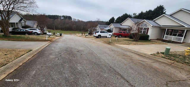 view of street featuring curbs