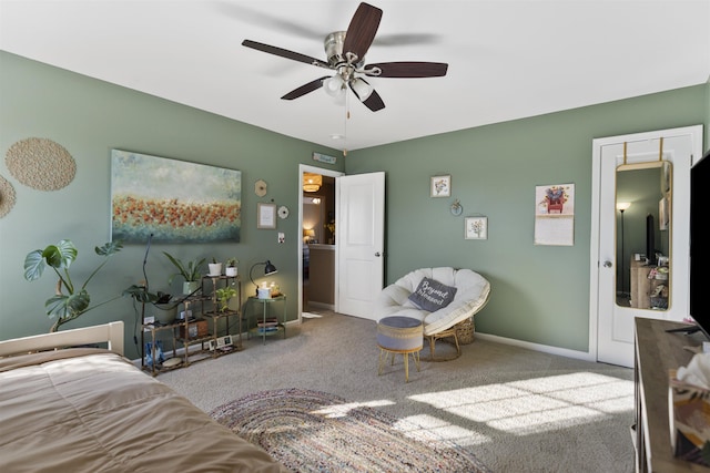 bedroom featuring carpet flooring, a ceiling fan, and baseboards