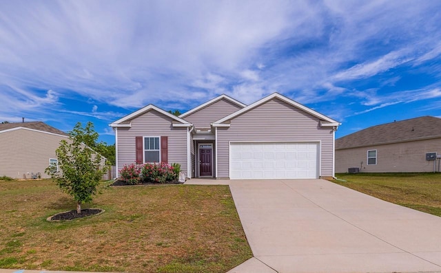 ranch-style home with driveway, an attached garage, a front lawn, and cooling unit