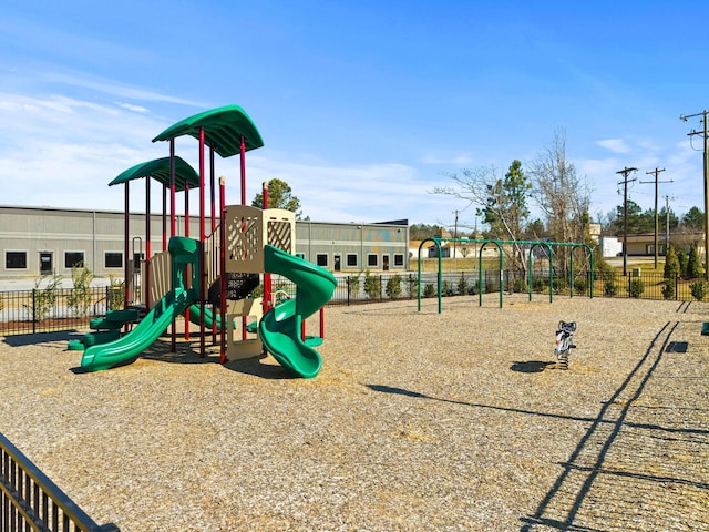 community jungle gym featuring fence