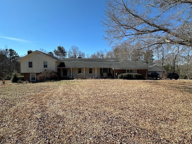 view of front of house with brick siding