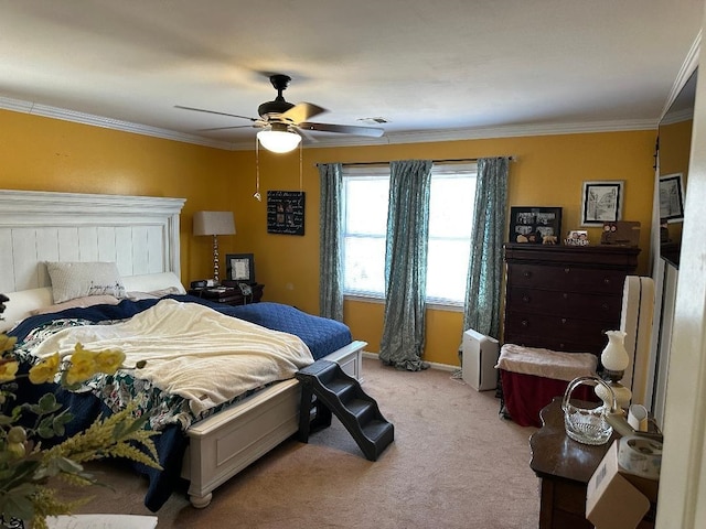 bedroom with light carpet, ornamental molding, visible vents, and a ceiling fan