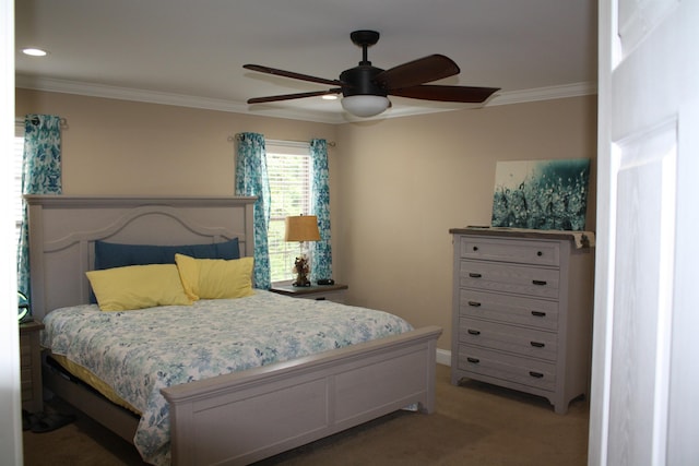 bedroom featuring light carpet, crown molding, and ceiling fan