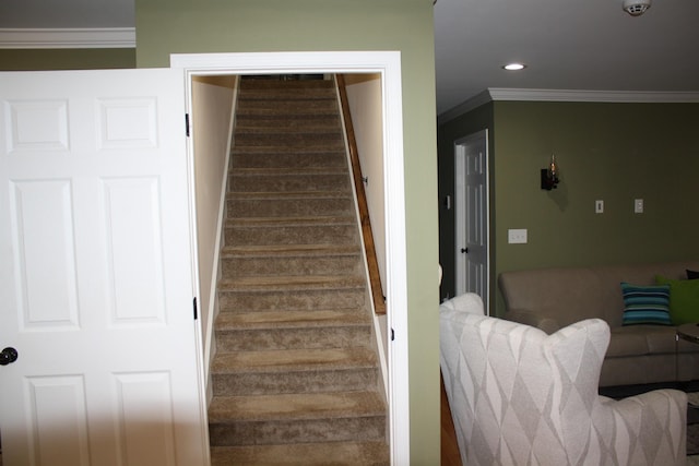 stairway featuring recessed lighting and crown molding