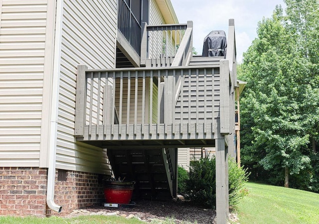 exterior space featuring stairs and a wooden deck