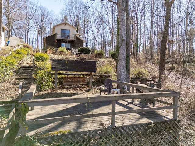 view of yard featuring a balcony