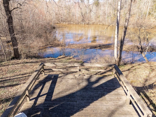 property view of water featuring a forest view