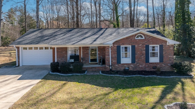 ranch-style house featuring covered porch, driveway, brick siding, and an attached garage