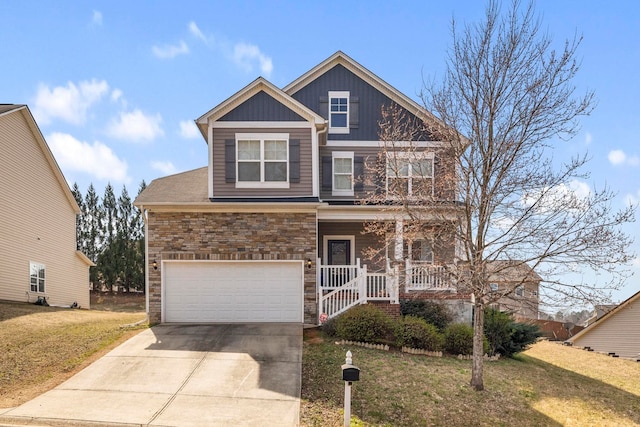 view of front of home featuring concrete driveway, a porch, board and batten siding, and a front yard