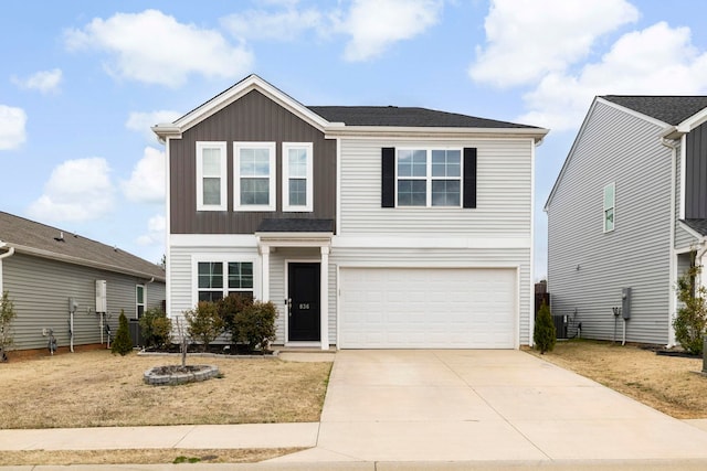 traditional home featuring a garage, driveway, board and batten siding, and central AC