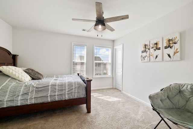 bedroom with a ceiling fan, carpet, visible vents, and baseboards