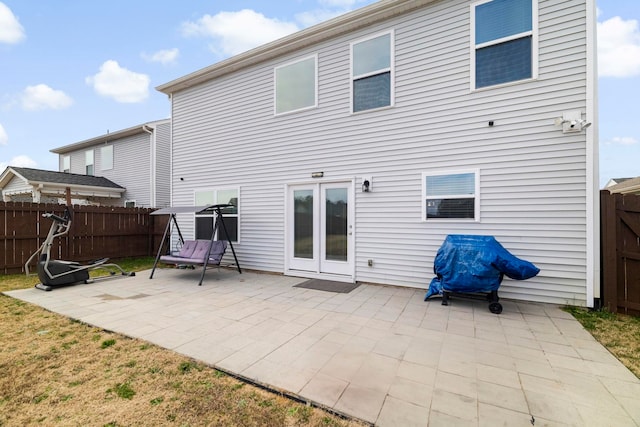 back of house featuring fence and a patio