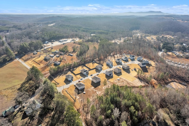 aerial view featuring a view of trees