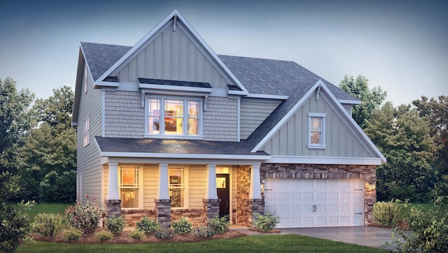 craftsman inspired home featuring board and batten siding, stone siding, driveway, and an attached garage