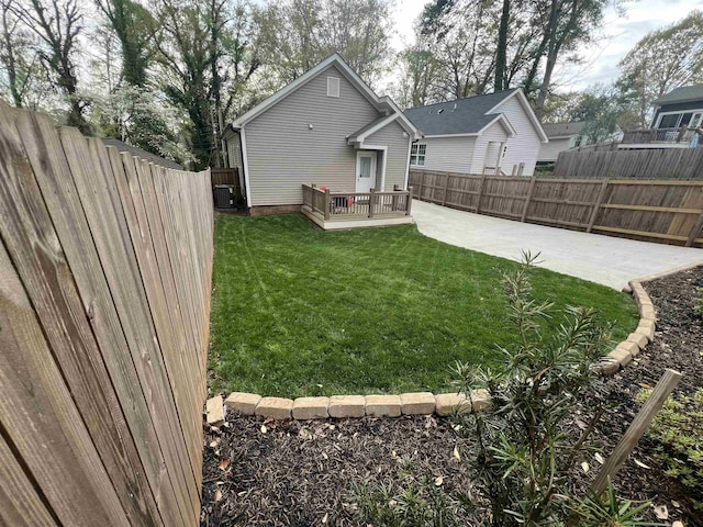view of yard featuring a fenced backyard and a patio