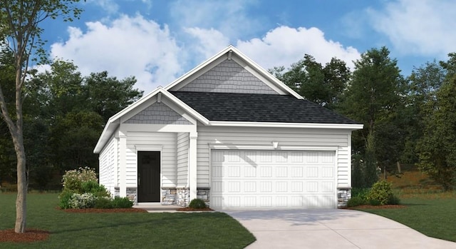 view of front of home with roof with shingles, concrete driveway, an attached garage, a front yard, and stone siding