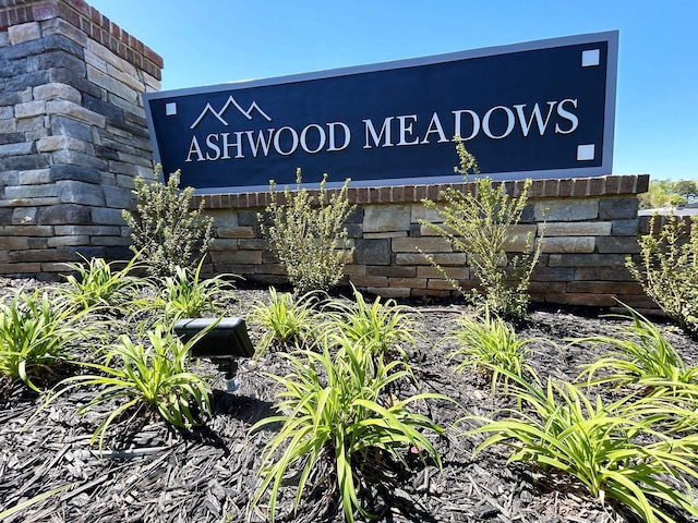 view of community sign