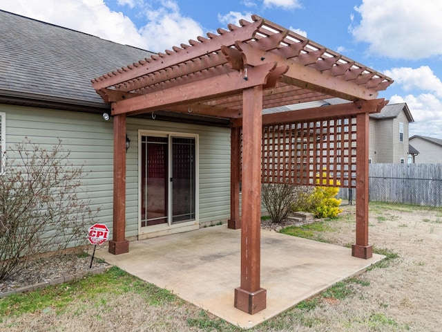 view of patio with fence and a pergola