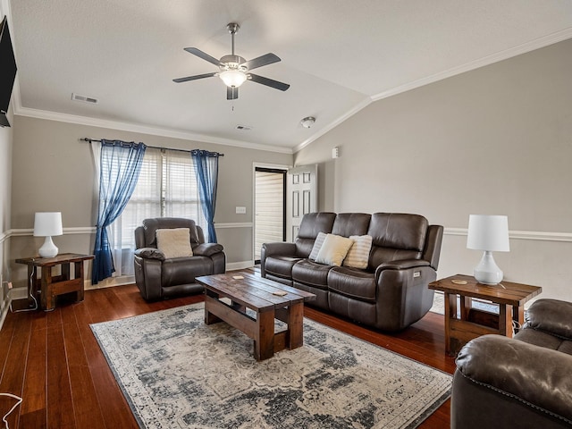 living room featuring lofted ceiling, dark wood-style floors, visible vents, and crown molding