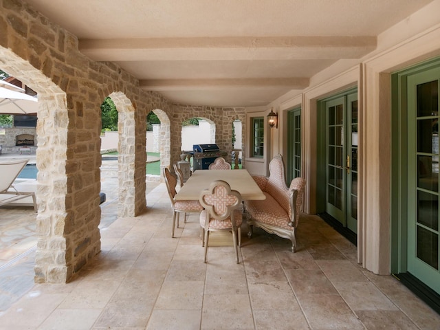 view of patio / terrace with french doors and a grill