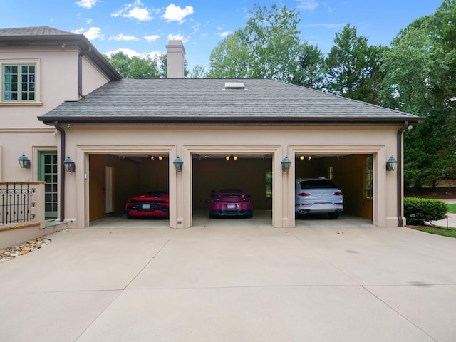 garage featuring driveway