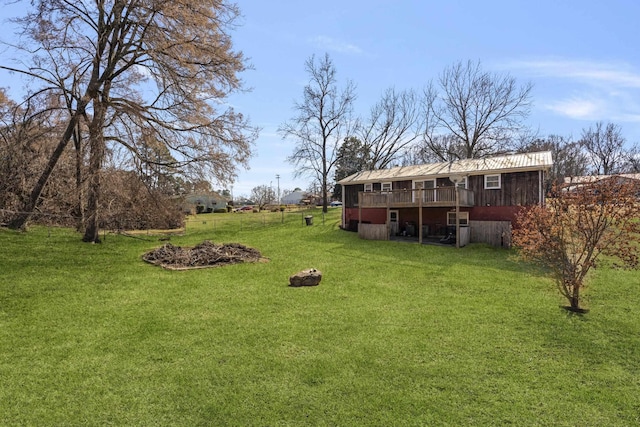 view of yard featuring a wooden deck