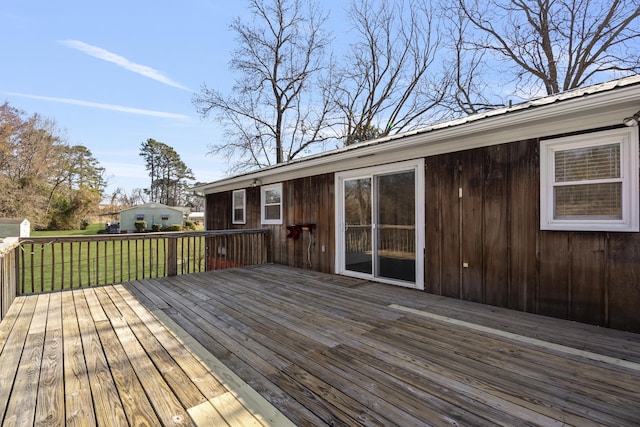 deck featuring a lawn