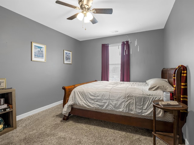 bedroom with a ceiling fan, carpet, visible vents, and baseboards