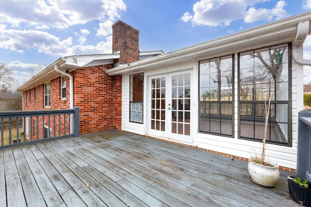 wooden terrace featuring french doors