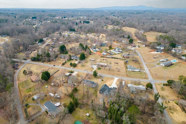 drone / aerial view with a forest view