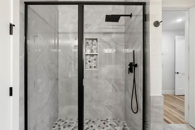 178 Cook, Chesnee, SC 29323 - bathroom featuring a marble finish shower, wood finished floors, and baseboards