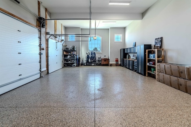 garage featuring baseboards