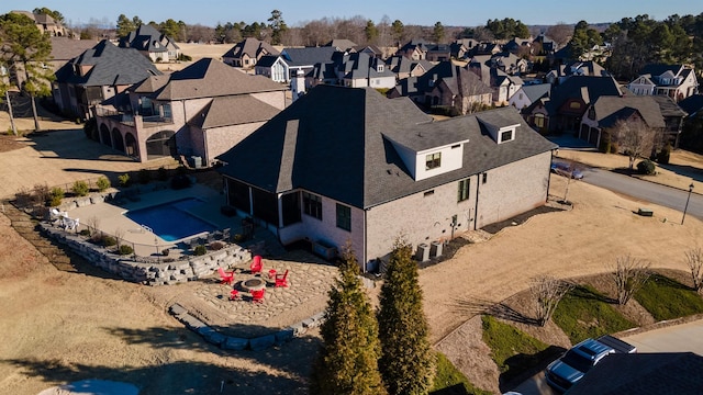 drone / aerial view with a residential view