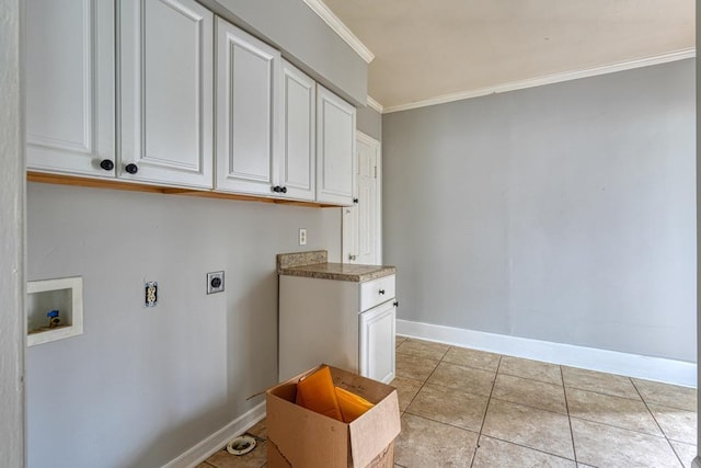 washroom with washer hookup, light tile patterned floors, cabinet space, ornamental molding, and hookup for an electric dryer