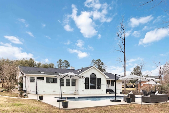 rear view of property featuring a patio, outdoor lounge area, fence, crawl space, and a chimney